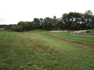 October 13.  Just to the left of Freeman Spur - the white stakes indicate where the pond will be sometime in the future.