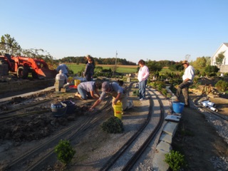 Ken and I decide they need some GOOD supervisors. We lcouldn't find any, so we headed up to do the job ourselves. Meanwhile, the rest of the crew pitched in to help install track and ballast. The sun was setting so we had to quit, leaving just a bit to do for Saturday.