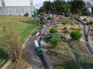 Later in the day, there's a bit of a traffic jam at Bluefield as our train never came in the house. I send my boxcab switcher out to move it out of the way. It struggles a bit, but eventually moves the cars.