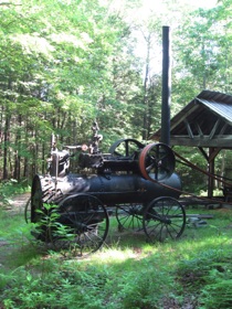A neat little steam engine powered the sawmill.