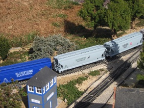 Andy’s train moves out of his basement window - and includes a modern J&B car.