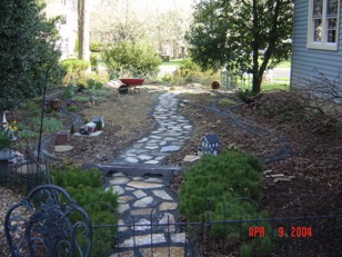 A few weeks later and the stone path is in place.