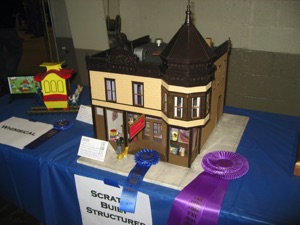 March 24.   The J. Radder building does well at the contest.
